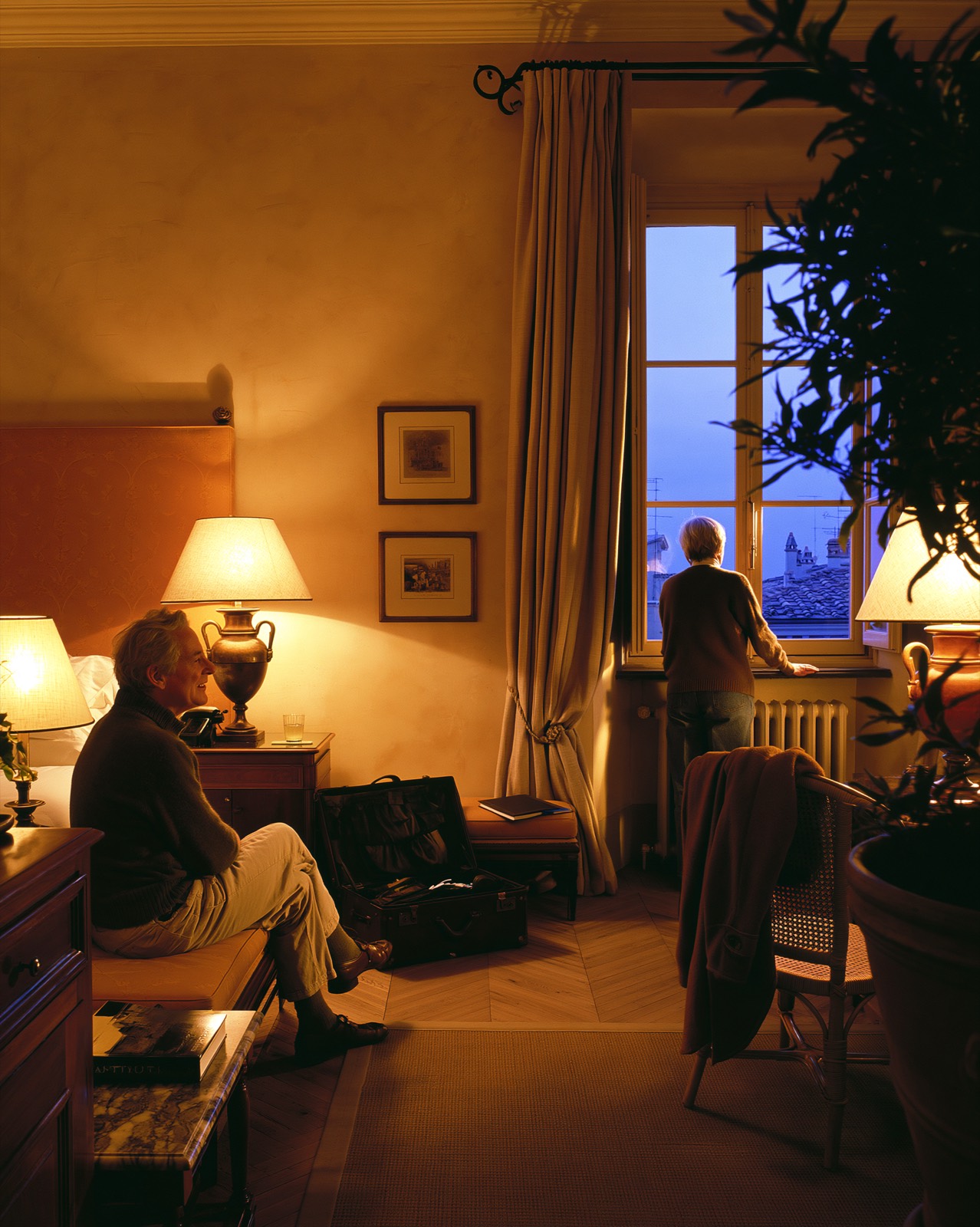 Hotel bedroom at dusk